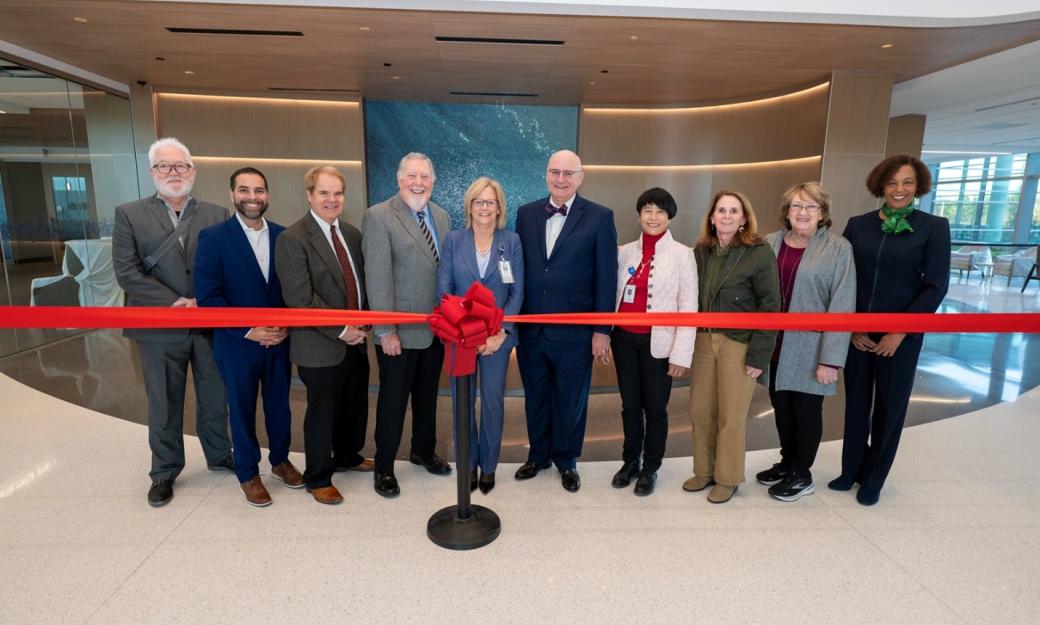 A group of 10 people, including GGC President Jann L. Joseph and members from the Gwinnett Hospital Authority cut a red ribbon on the new Northside Hospital Tower