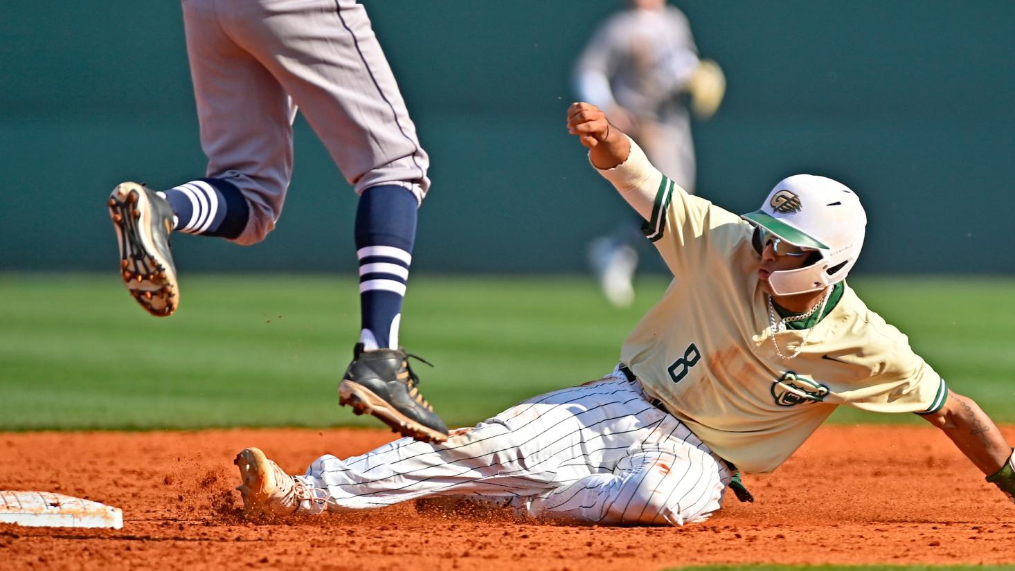action photo of two baseball players playing in a game