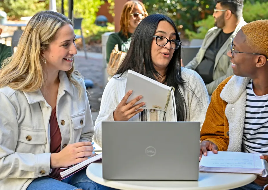 students talking outside