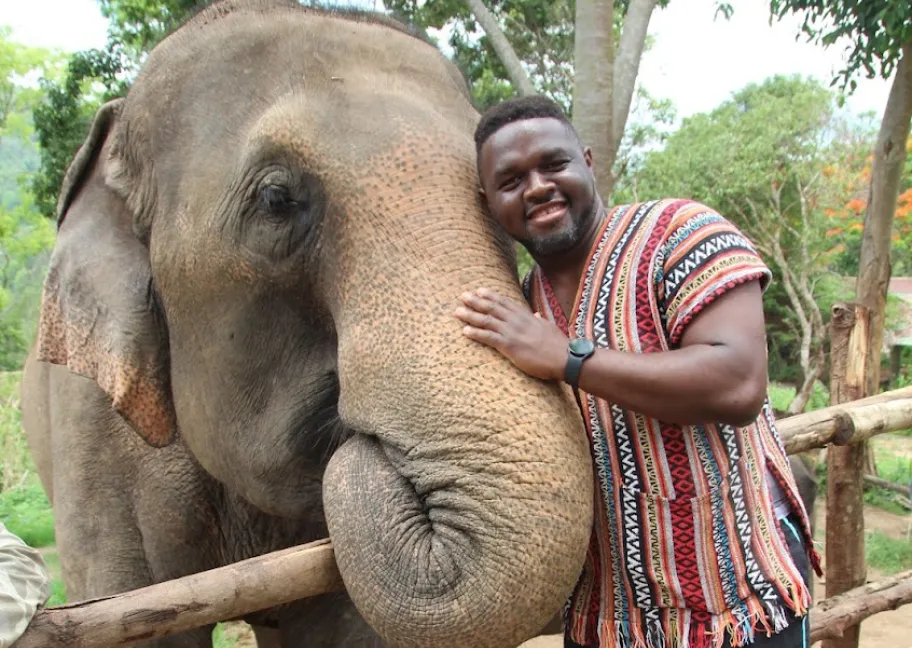 Dr. Neville Forlemu visits an elephant sanctuary in Thailand.