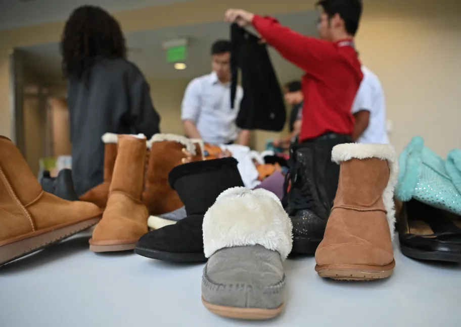 Display of shoes and shoppers in the Grizzly Thrift