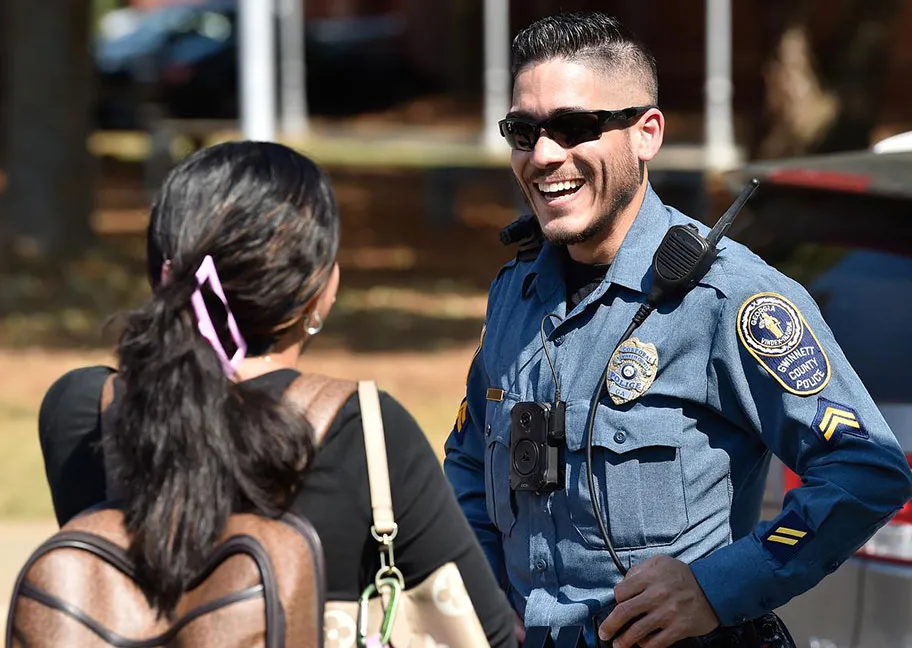 Gwinnett County Officer speaking with student at the Preparedness and Safety Fair