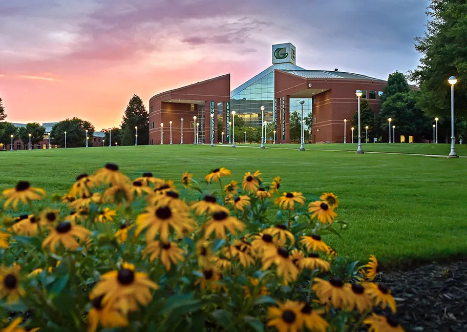 Sunset view of Building B and the Lawn