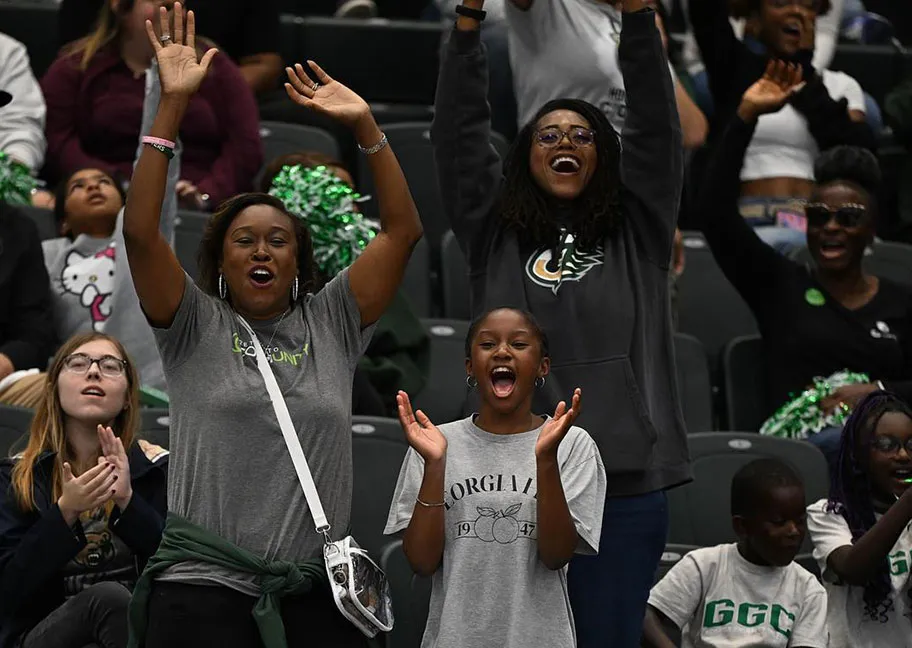 GGC staff fans cheering at the Homecoming basketball game