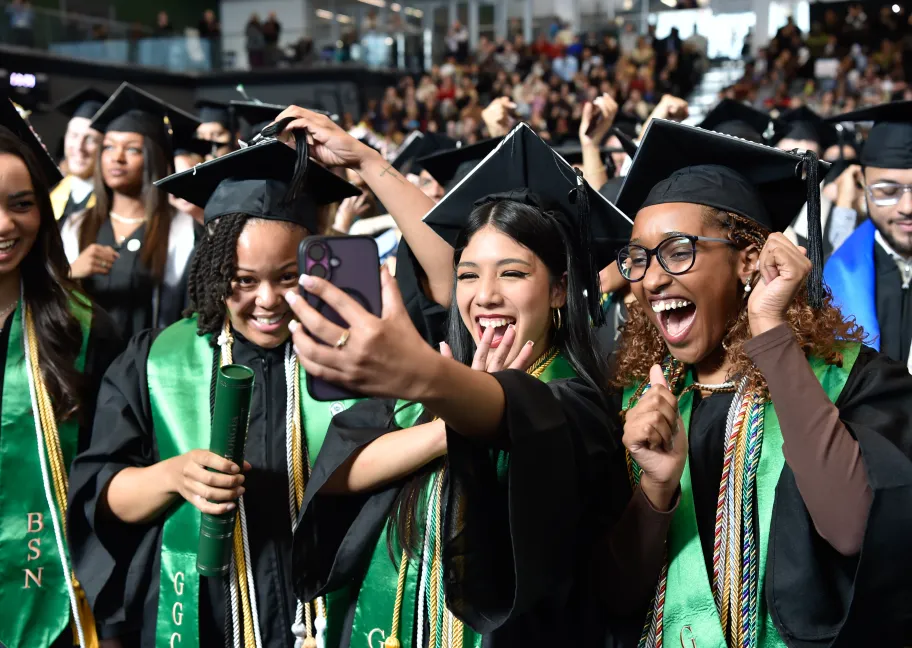Group photo of fall 2025 commencement graduates in the GGC Convocation Center