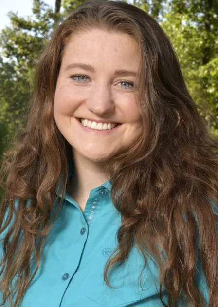 Graduate Autumn Burgess smiling