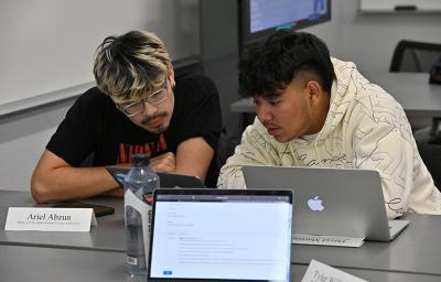 Two GGC students collaborating during class