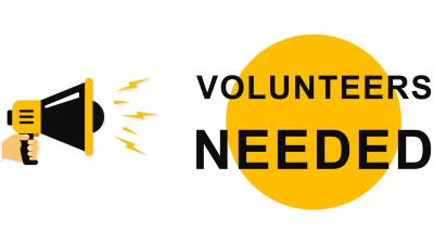 Yellow and black volunteers needed image with cartoon hand holding bullhorn