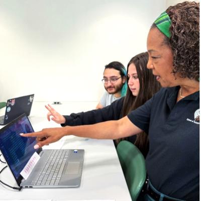 Students showcase their research to Dr. Jann L. Joseph at STaRS 2026