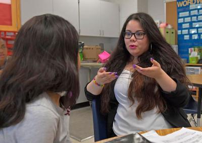 GGC student teacher instructing a student during her teaching experience in Gwinnett schools